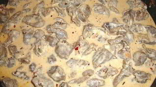 Рецепт Куриных сердечек, тушенных в сливках