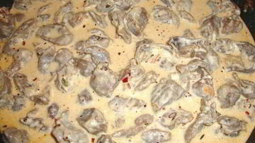 Рецепт Куриных сердечек, тушенных в сливках