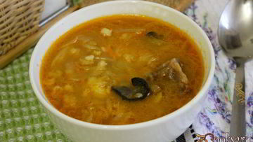 Рецепт Щей из квашенной капусты с грибами и перловкой