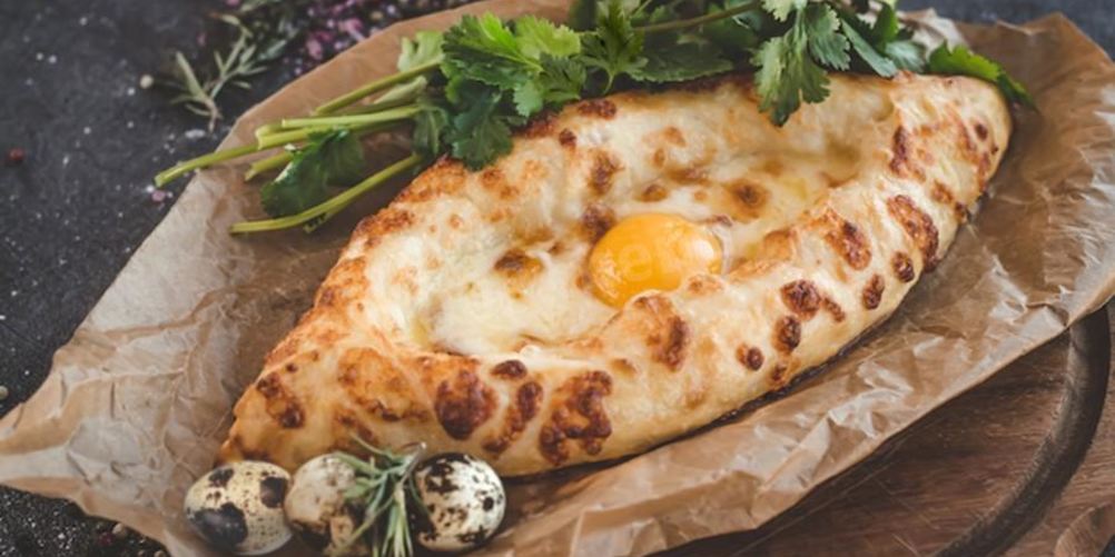 Как приготовить хачапури по аджарски из слоеного теста