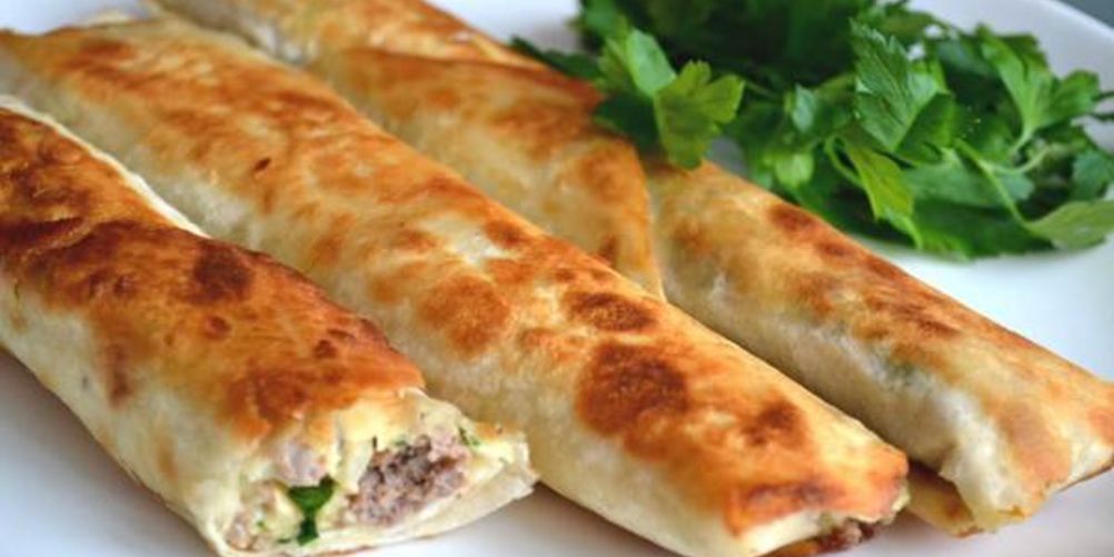 Как приготовить сытный лаваш с начинкой в духовке